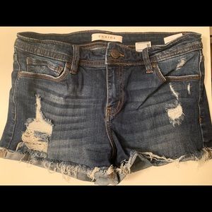 Distressed denim shorts